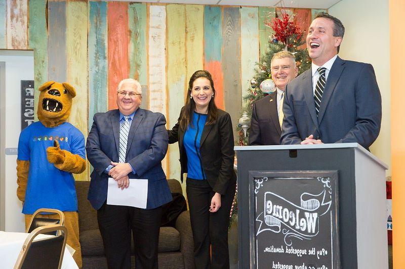 From left to right: Ted Kopas, Westmoreland County Commissioner;  Charles Anderson, Westmoreland County Commissioner; Gina Cerilli, Westmoreland County Commissioner;  Thomas Guzzo, Mayor, City of New Kensington;  Nittany Lion, Penn State University